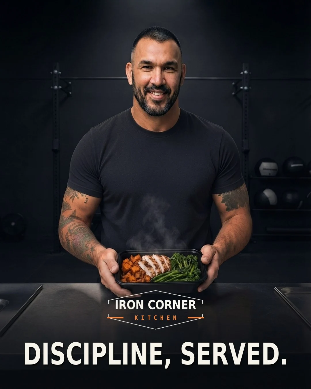 Frankie offering a steaming meal tray — Iron Corner Kitchen. Discipline, served.