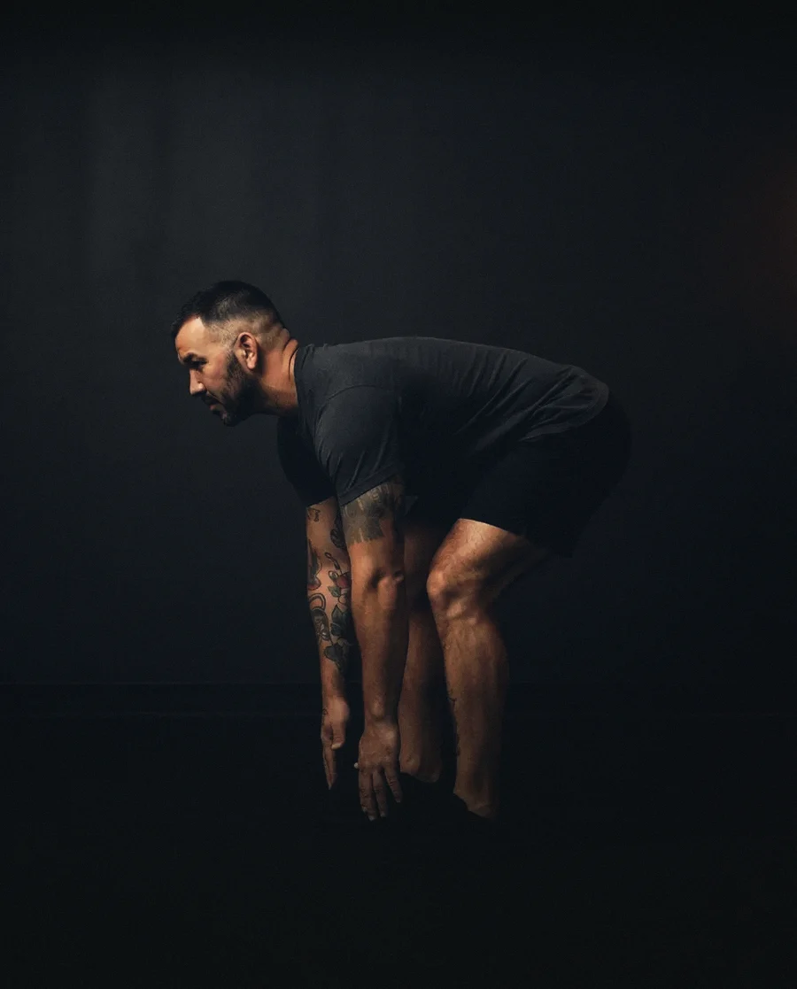 Frankie demonstrates Standing hip hinge ground touch