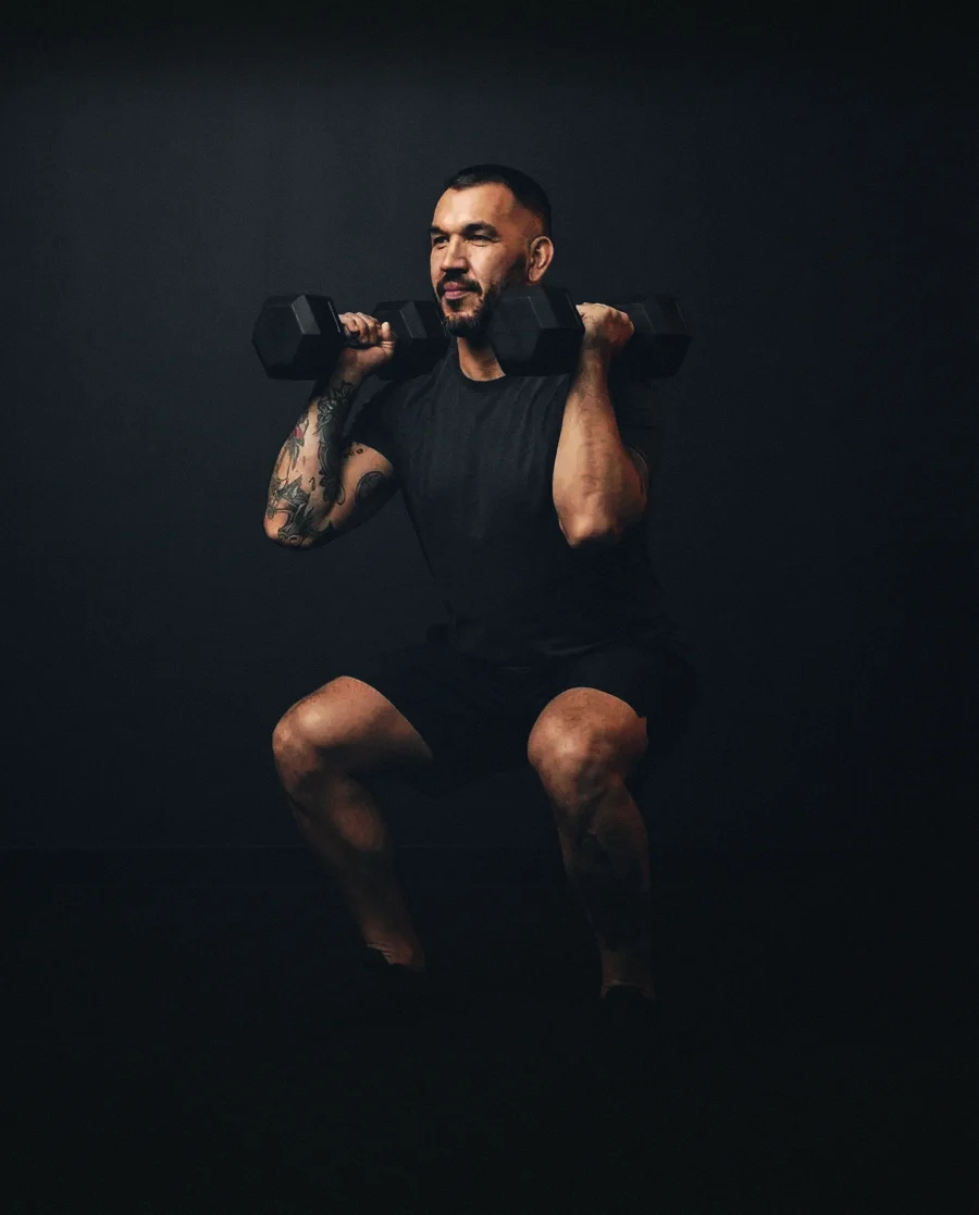 Frankie demonstrates Double dumbbell front squat